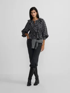 Blusa chorreras cuadros negros