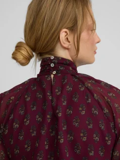 Blusa cuello estampado motivos burdeos
