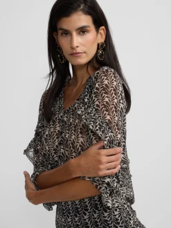Blusa volantes estampado negros