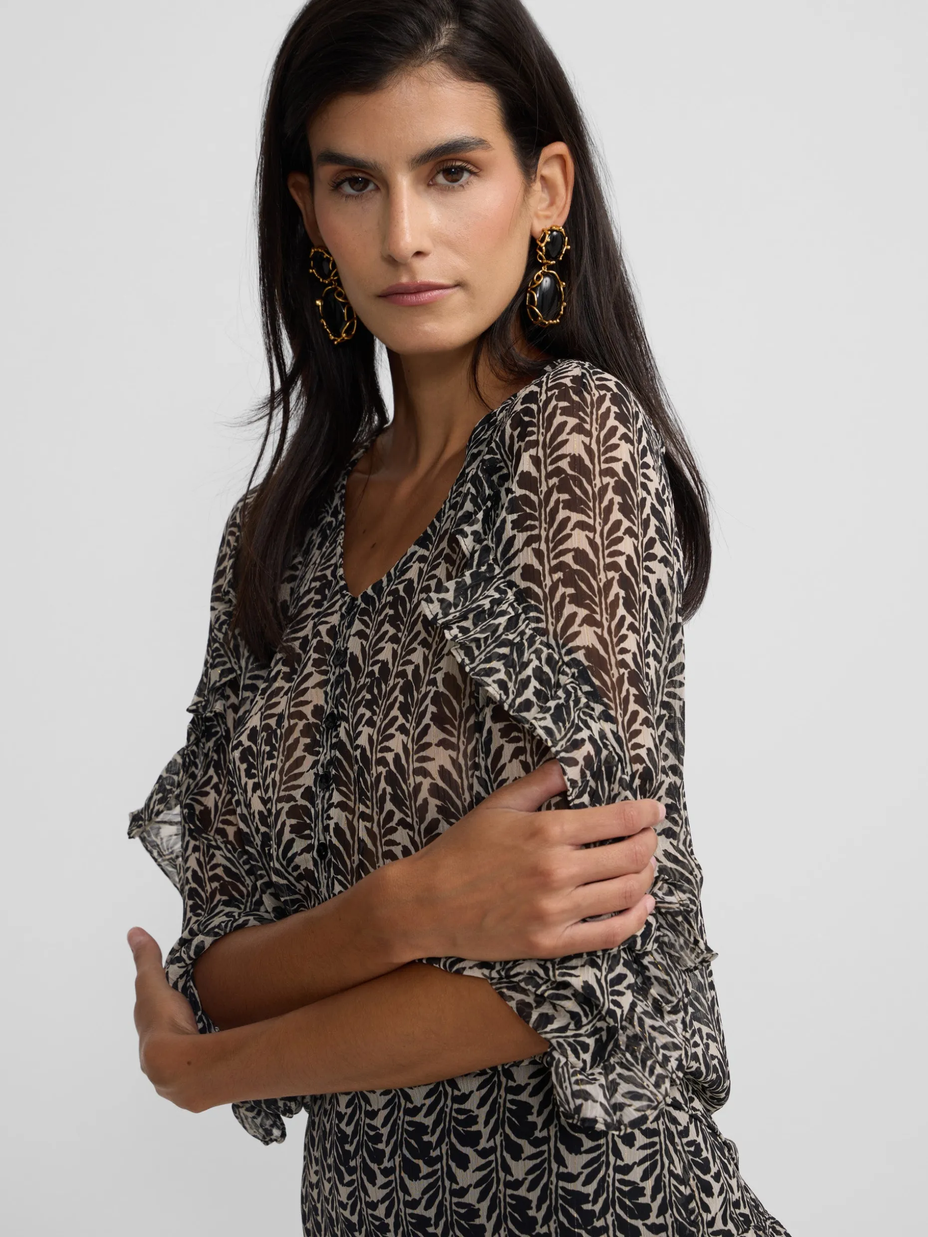 Blusa volantes estampado negros
