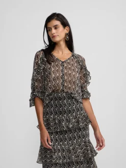 Blusa volantes estampado negros