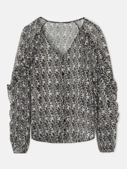 Blusa volantes estampado negros