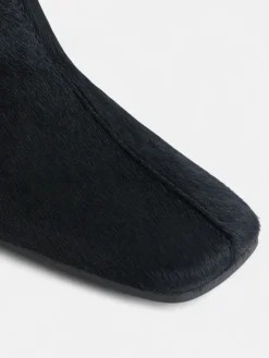 Botin tacon pelo negro
