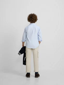 Camisa sport oxford kids celeste raya fina blanca