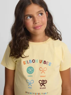 Camiseta girl silbon vibes amarilla