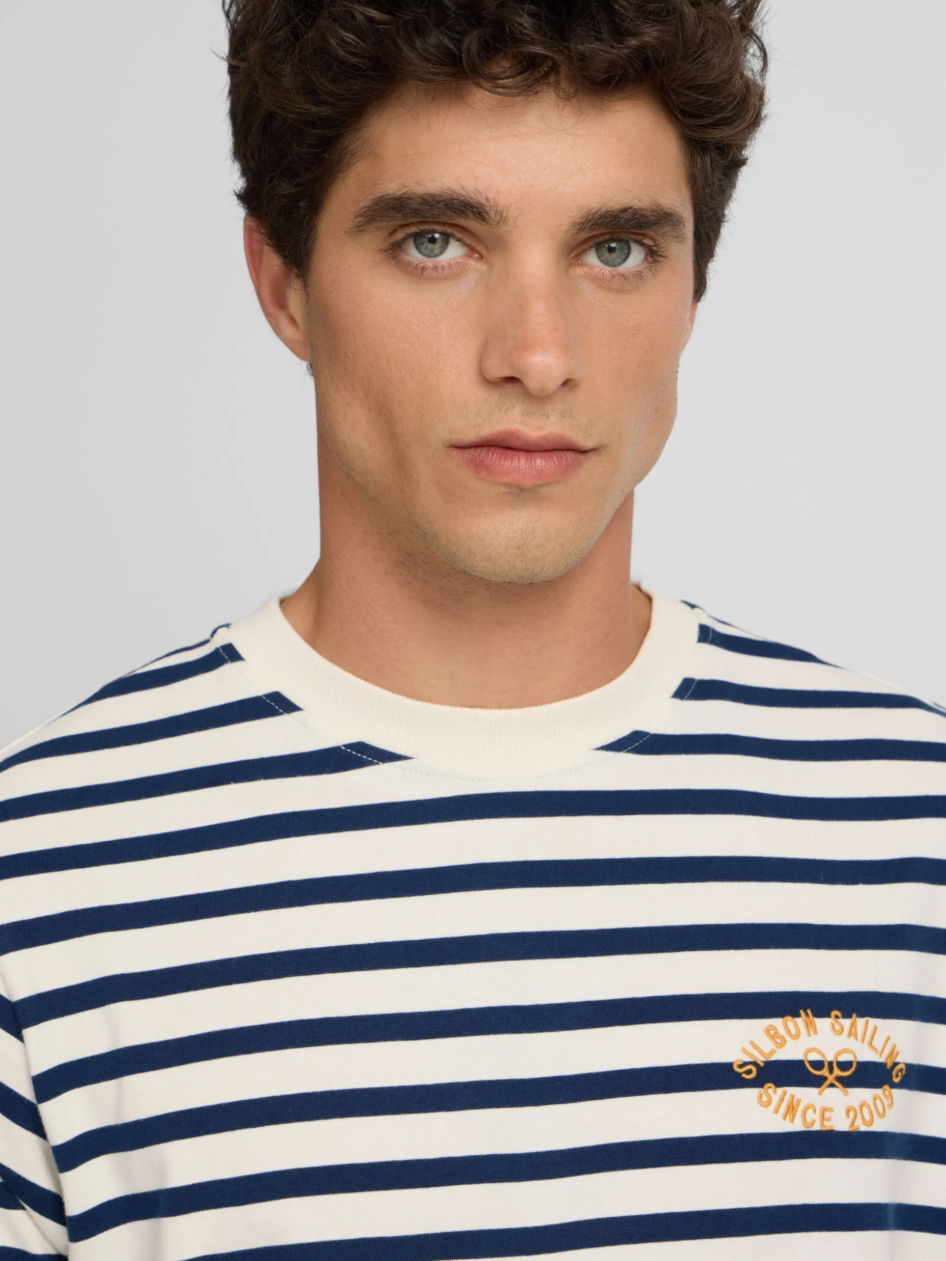 Camiseta raya media azul marino