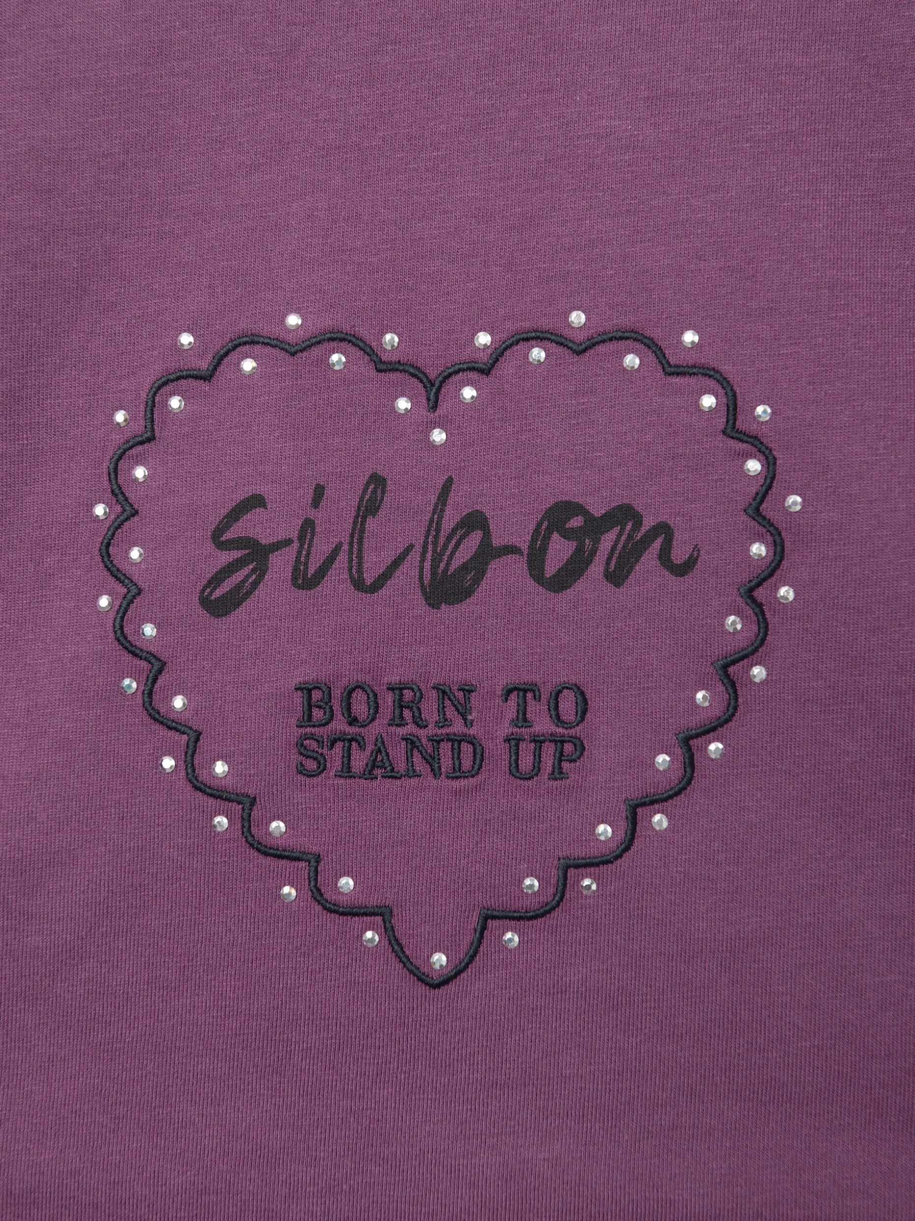 Camiseta woman roll out corazon tachas morado