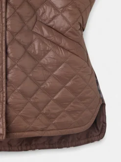 Chaleco acolchado tejido combinado marron