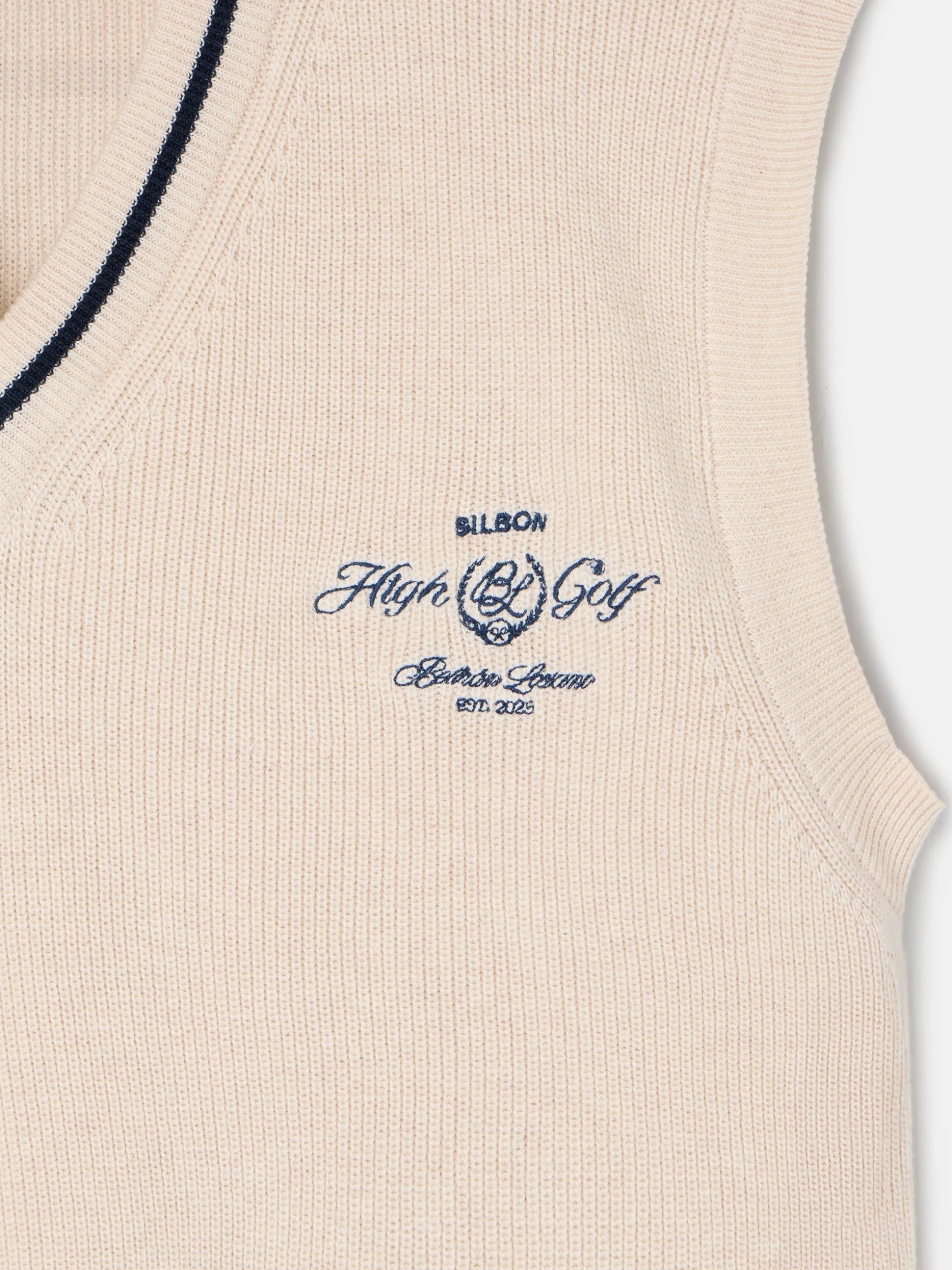 Chaleco Beltran Lozano punto cuello pico crema