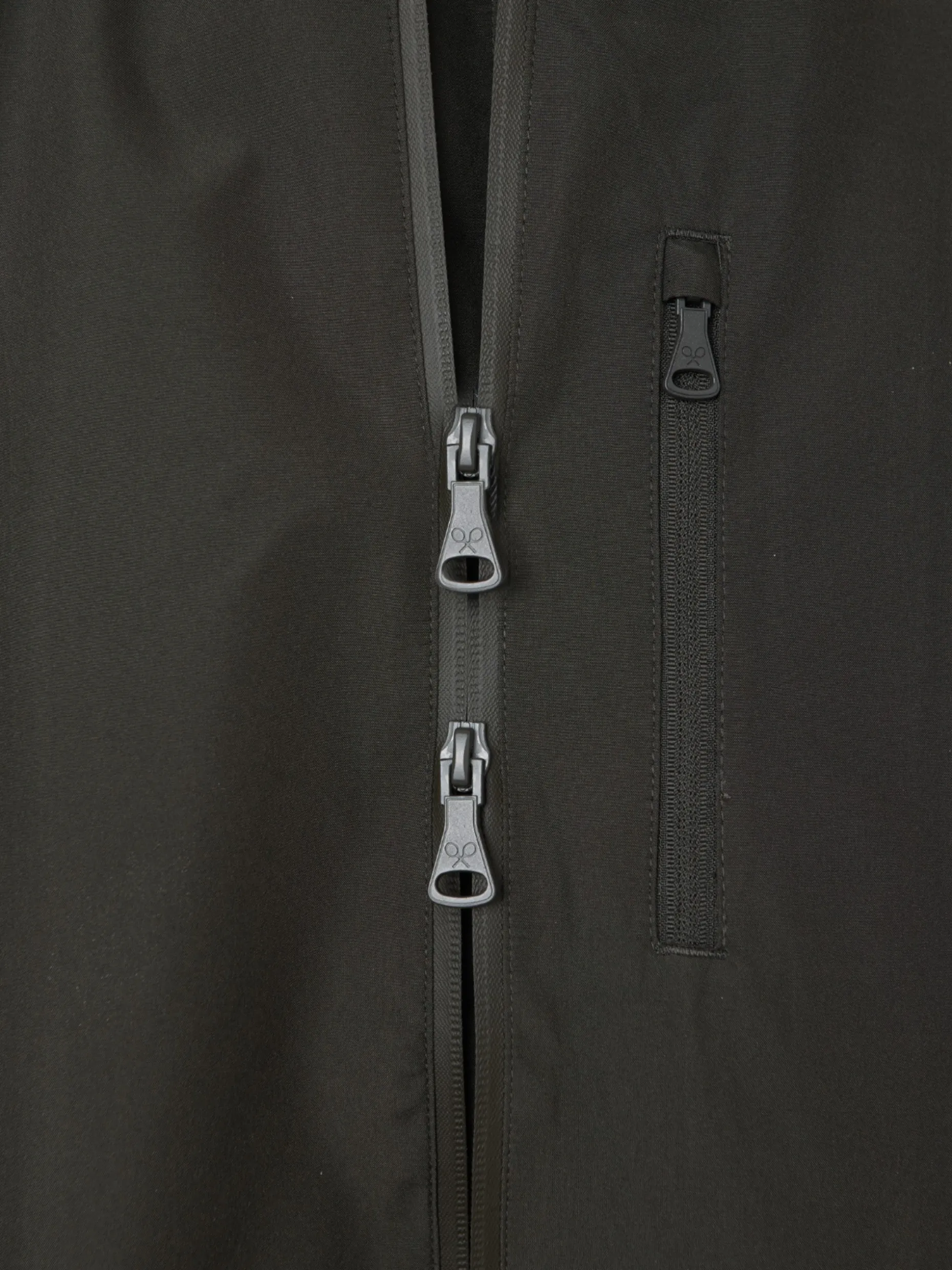 Chaqueta capucha cortavientos verde