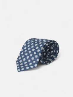 Corbata motivo flor azul marino