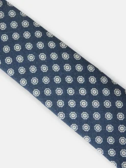 Corbata motivo flor azul marino