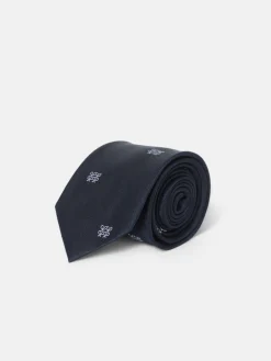 Corbata motivo geometrico raquetas azul marino