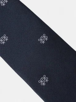 Corbata motivo geometrico raquetas azul marino