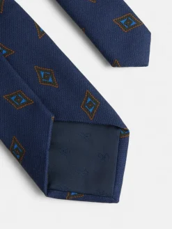 Corbata motivo rombo azul marino
