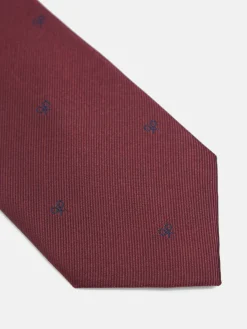 Corbata silbon motivos raquetas burdeos