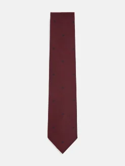 Corbata silbon motivos raquetas burdeos