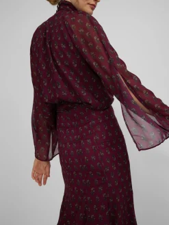 Falda midi estampado motivos burdeos