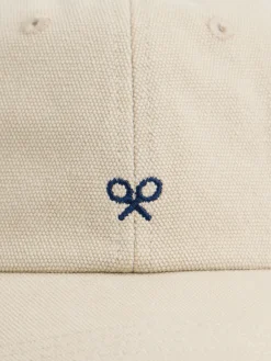 Gorra raquetas bordadas beige