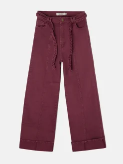 Pantalon denim cinturon trenza granate