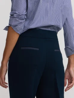 Pantalon vestir detalles saten marino