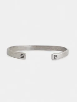 Pulsera metalica grabada