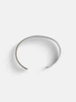 Pulsera metalica grabada