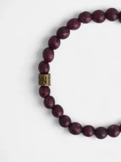 Pulsera piedras redondas burdeos