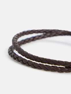 Pulsera piel trenzada detalle raqueta