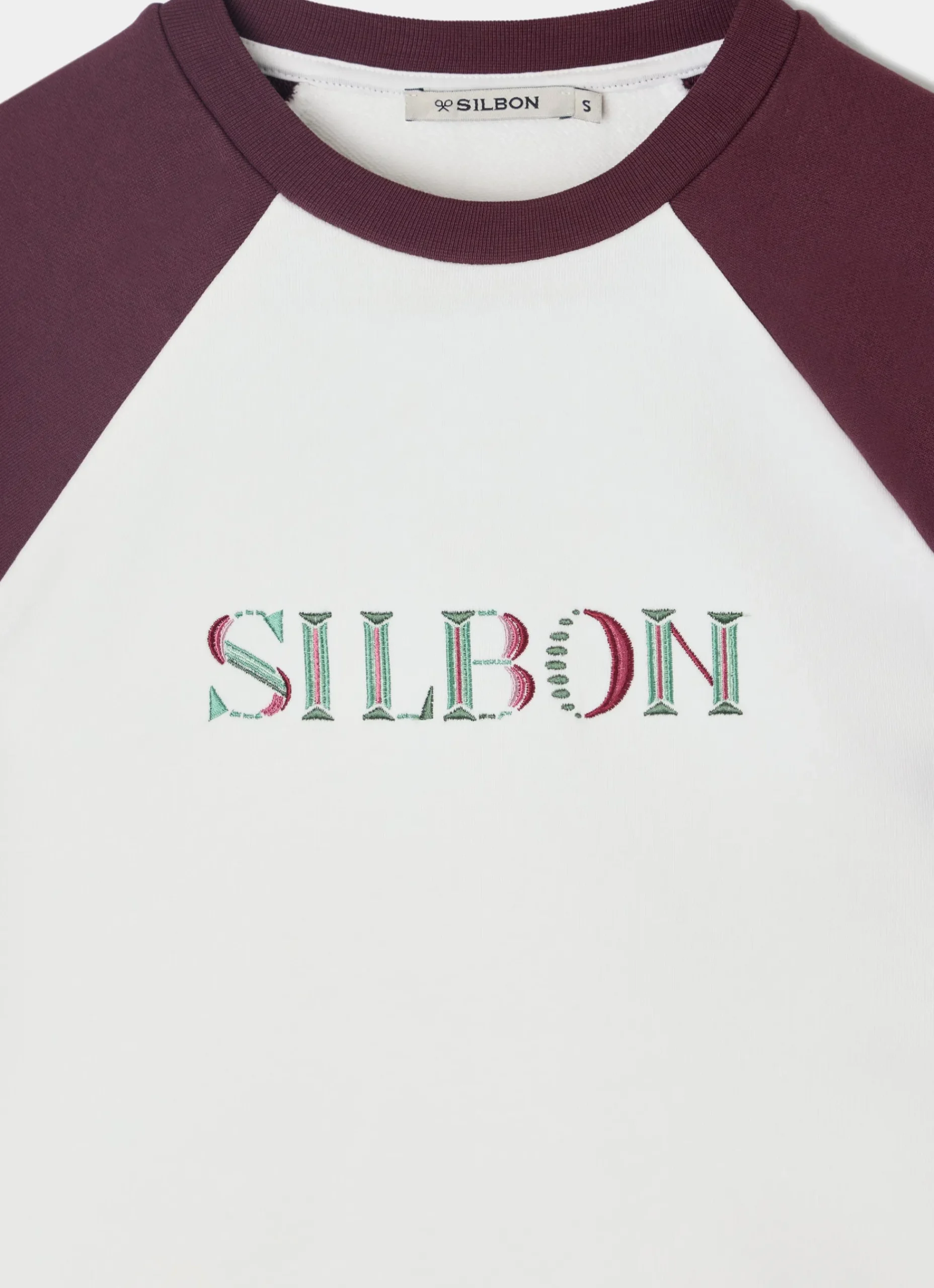 Sudadera woman letras colores burdeos