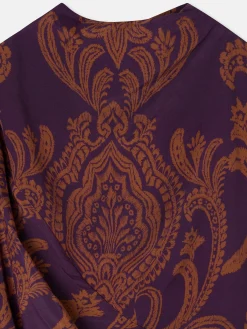 Vestido mini drapeado estampado morado y camel