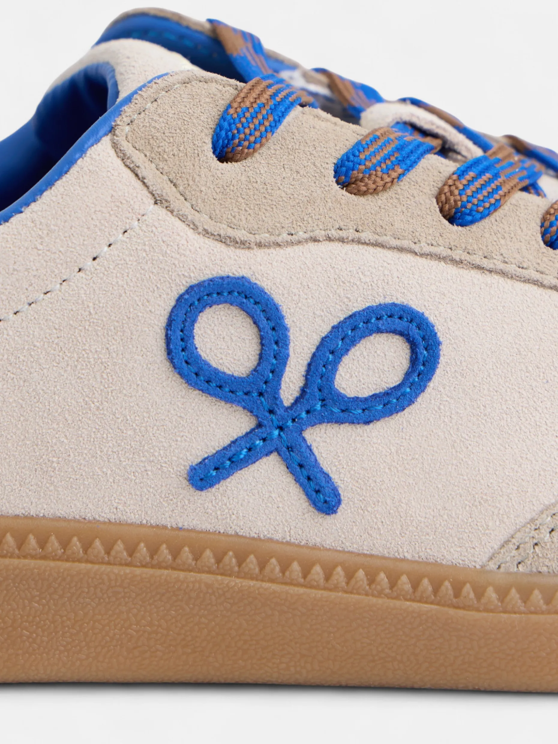 Zapatilla raqueta beige y azul