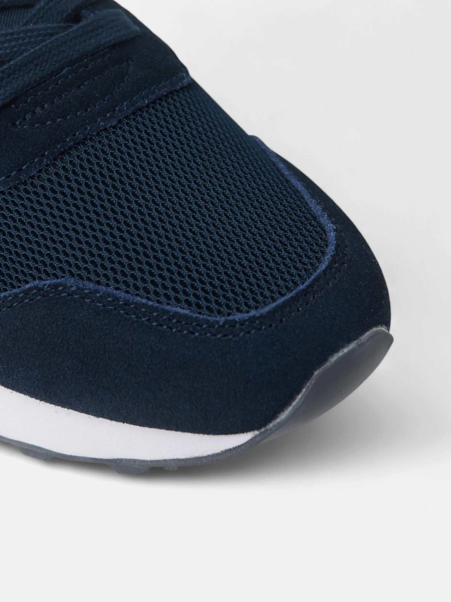 Zapatilla running clasica azul marino