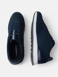 Zapatilla running clasica azul marino