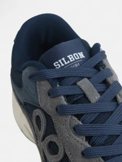 Zapatilla running tono azul