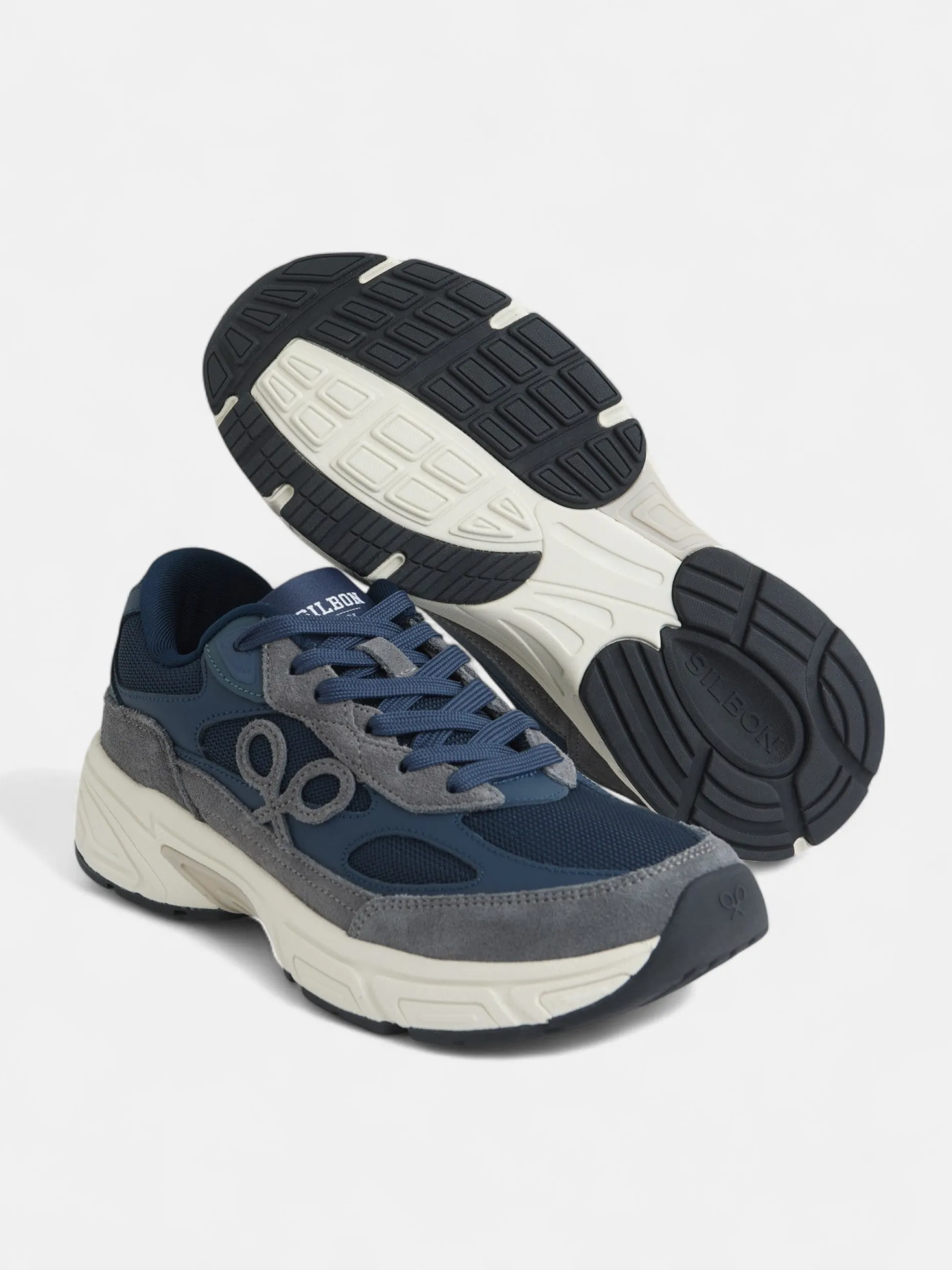 Zapatilla running tono azul